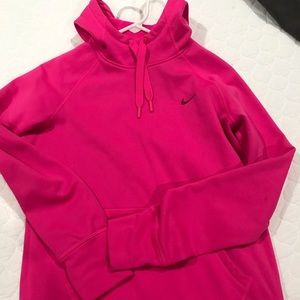Hot pink Nike pullover. Size medium but fits more like a small.